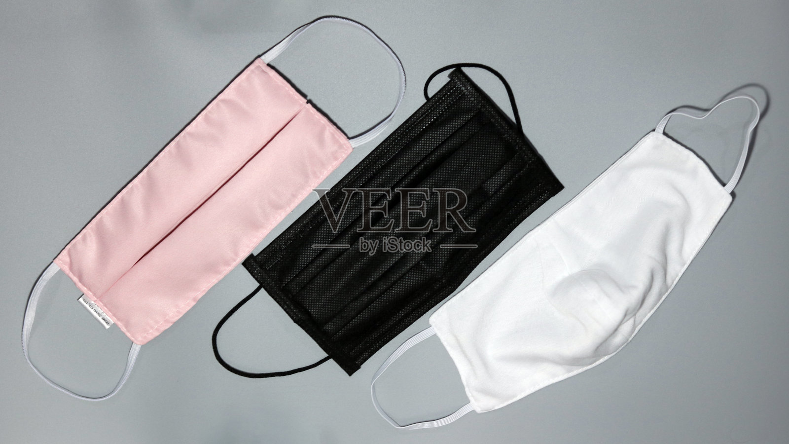 预防Covid-19病毒的各种布口罩照片摄影图片