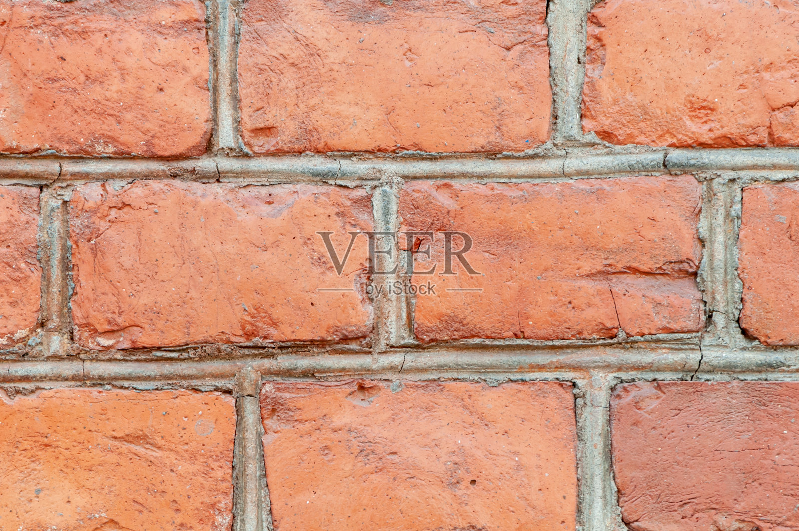 日晒雨淋沾污的老砖墙背景照片摄影图片