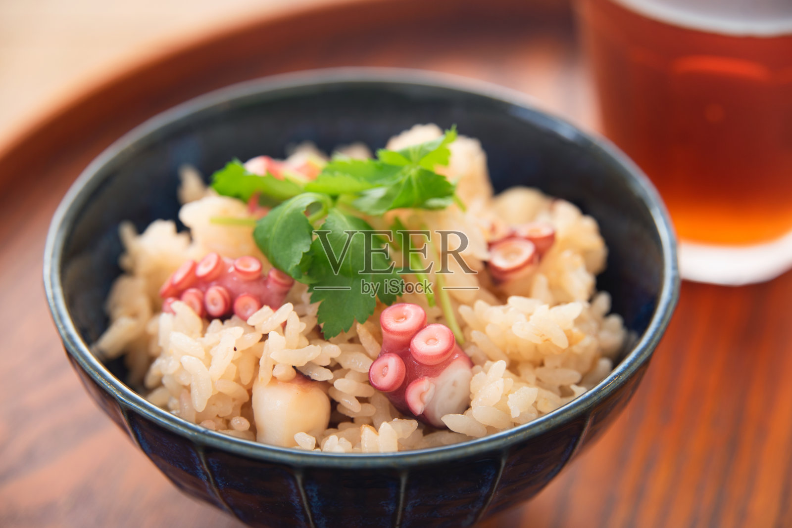 日本料理章鱼拌饭照片摄影图片