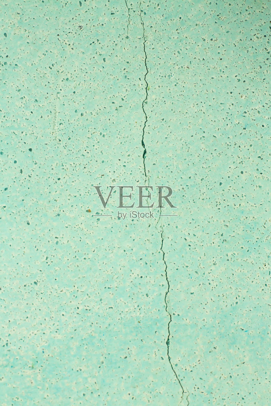 有裂缝的小青石混凝土纹理，表面粗糙的水泥背景，近距离微距拍摄，选择性聚焦，室内家居修复概念照片摄影图片