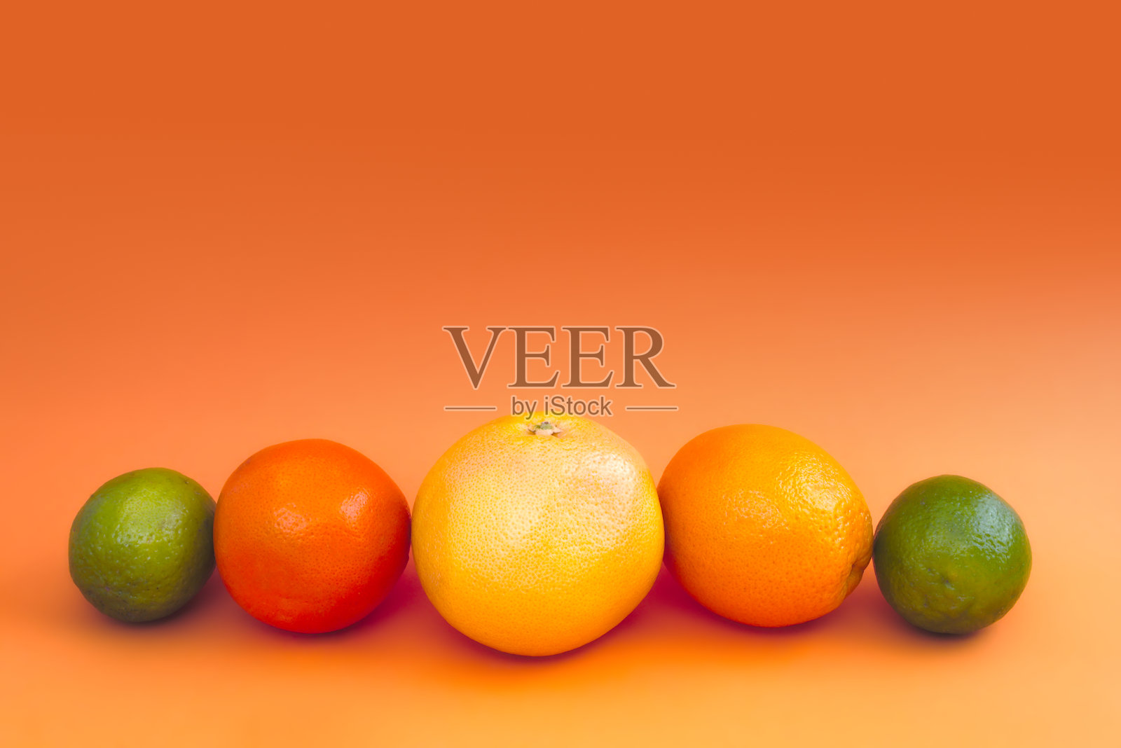 柑橘类水果橙色背景新鲜天然维生素照片摄影图片