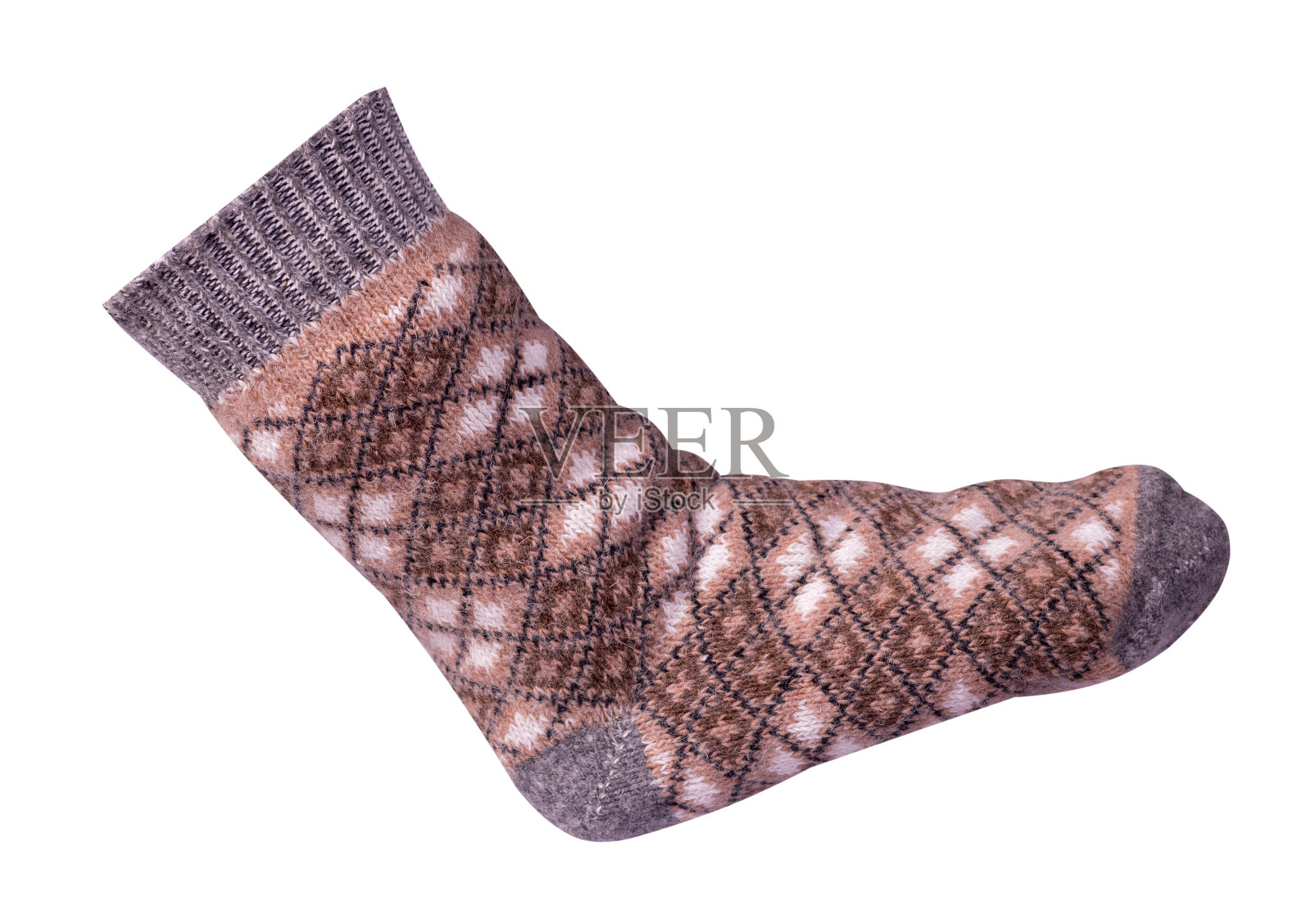 孤立在白色背景上的羊毛袜。照片摄影图片