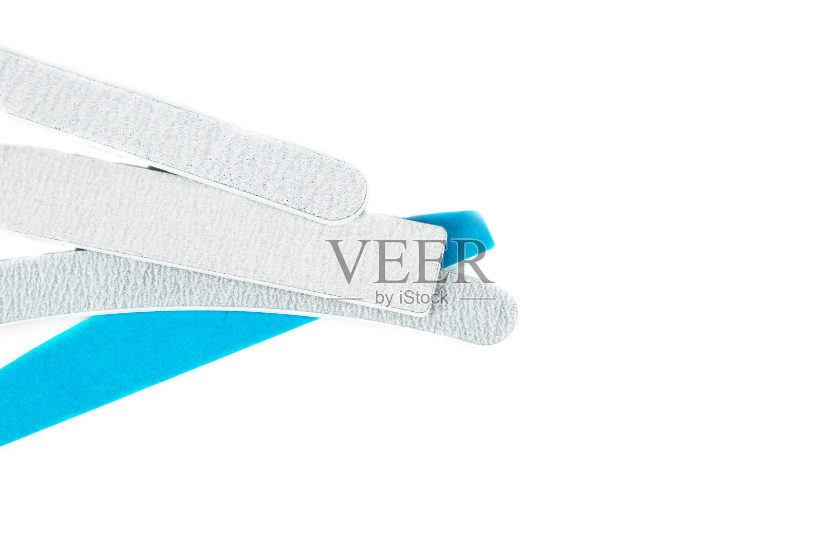 指甲锉被孤立在白色背景上。美甲、身体护理的概念。创意背景，复制空间。照片摄影图片