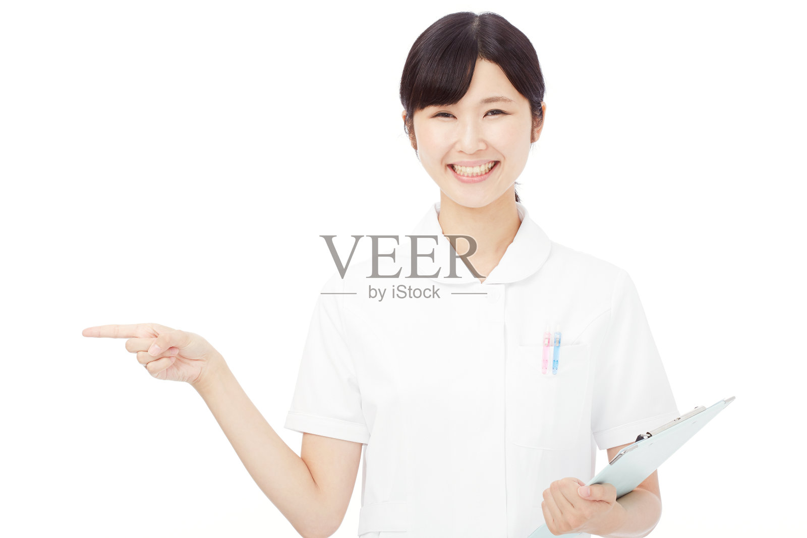 亚洲女人指着一边照片摄影图片