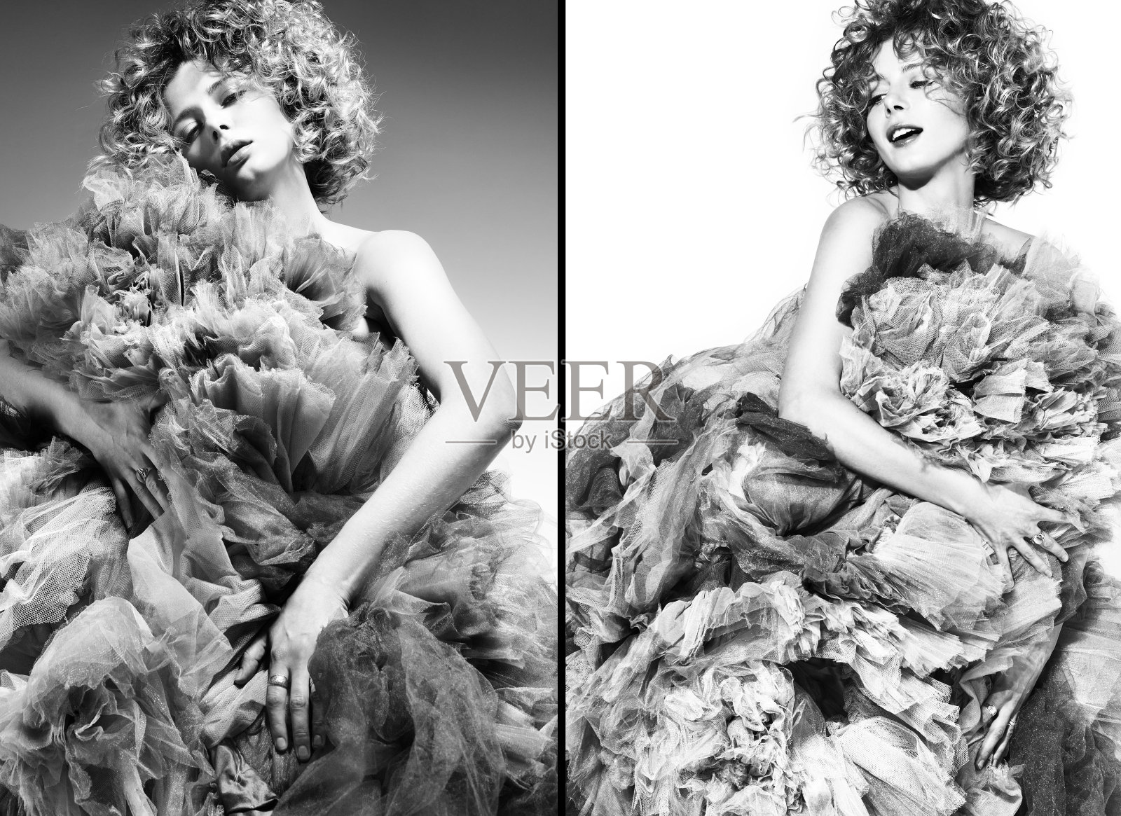 对比黑白图像的美丽年轻女子在一个白色的背景上穿着一件宽松的裙子照片摄影图片