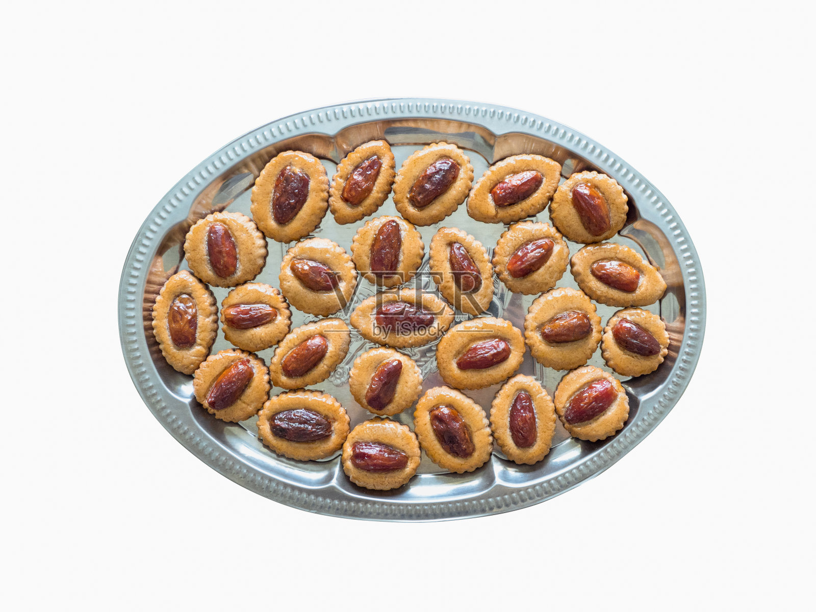 孤立自制的开斋节枣糖果。照片摄影图片