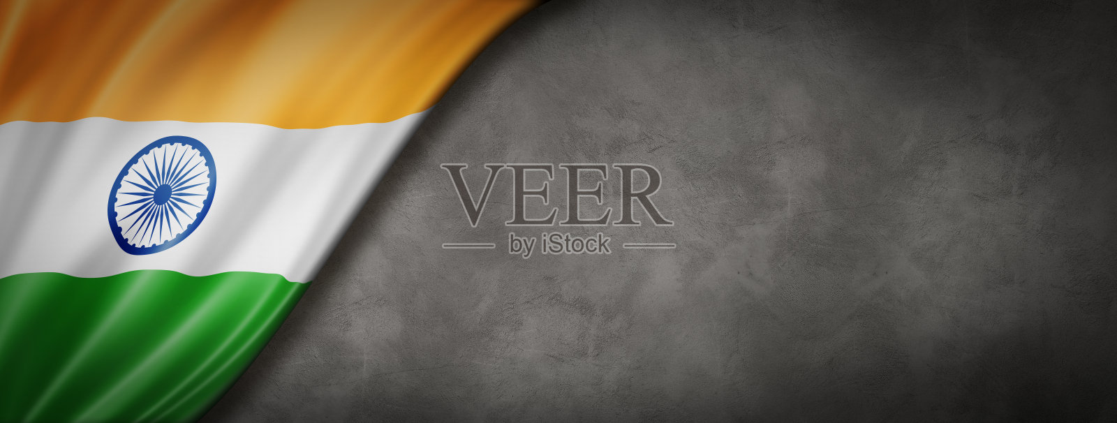 混凝土墙上挂着印度国旗照片摄影图片