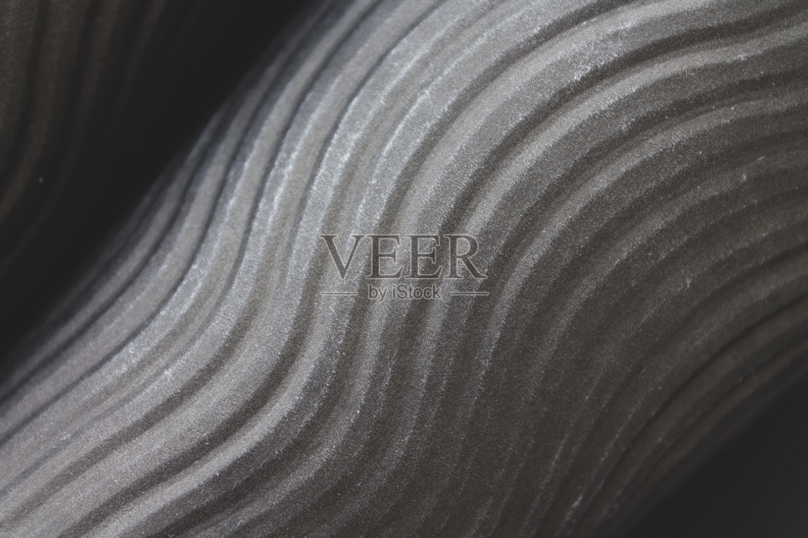 黑色单色抽象背景与体积对角螺旋线纹理。时尚的背景为您的设计工作，卡片，壁纸照片摄影图片