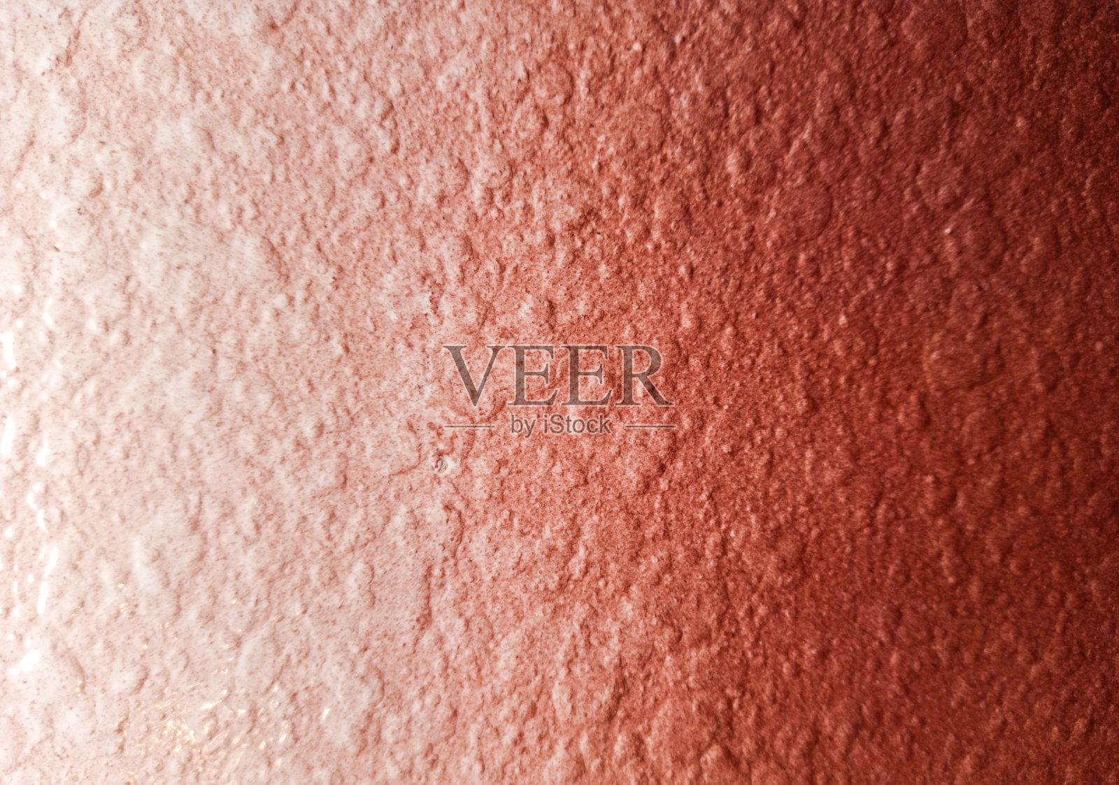 红色粗糙的墙面纹理背景。照片摄影图片