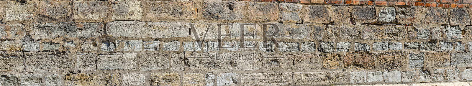 古老的天然石材背景。灰色垃圾石纹理。摘要岩石的细节。全景。照片摄影图片