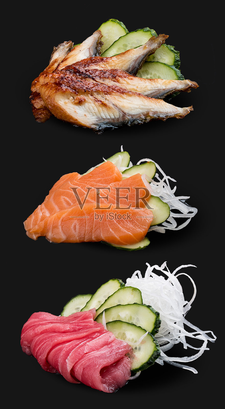 生鱼片:鳗鱼，鲑鱼，金枪鱼。在黑暗的背景照片摄影图片