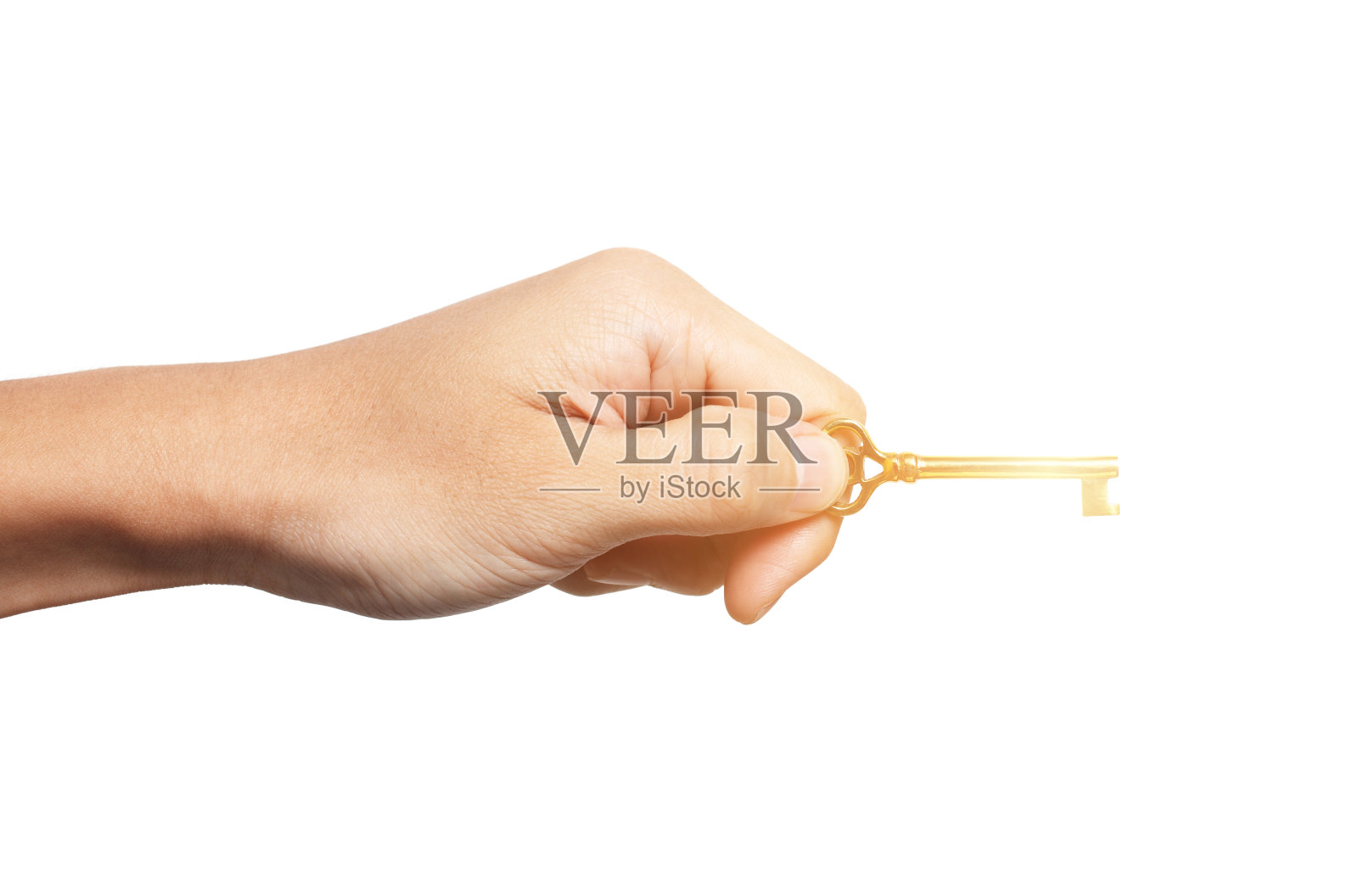在白色背景上转动一把金色万能钥匙的手的解决方案照片摄影图片