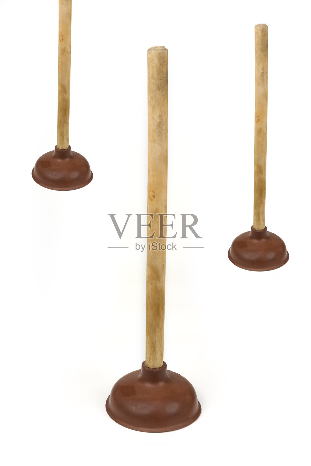 带有长木柄的橡胶活塞照片摄影图片