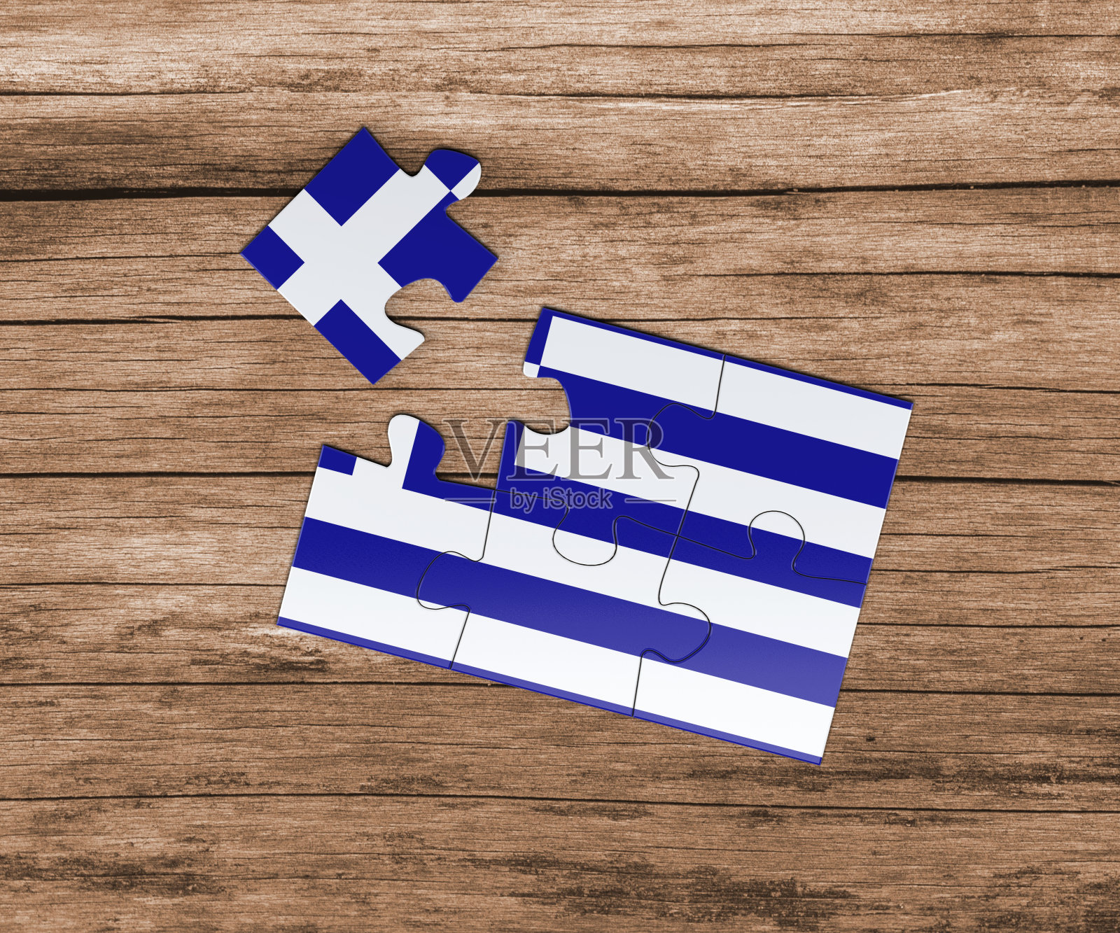 希腊国旗上的拼图。有一件遗失了。危险的概念。照片摄影图片