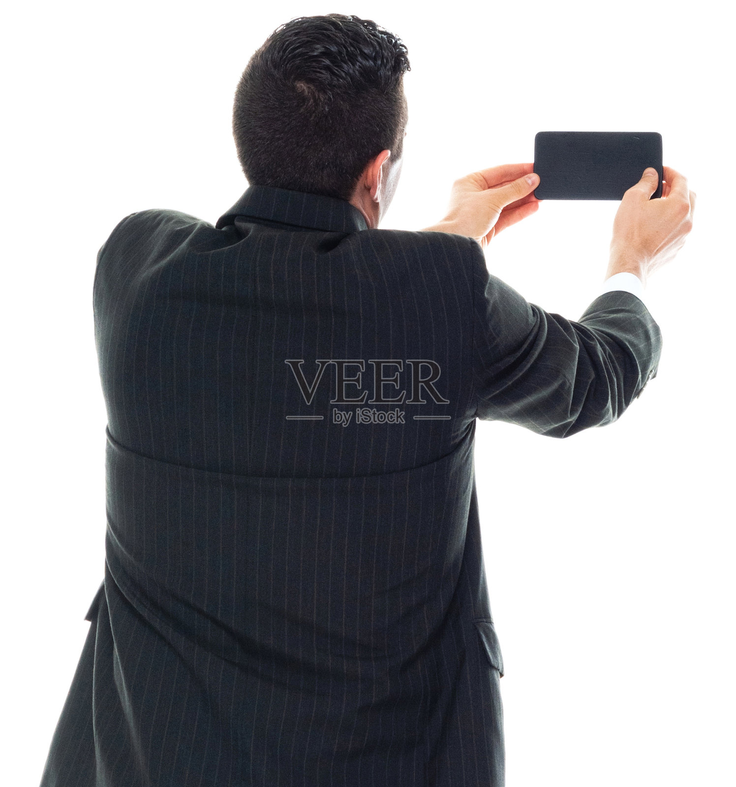 白种人年轻男性摄影站在白色背景穿着商务服装和使用手机照片摄影图片