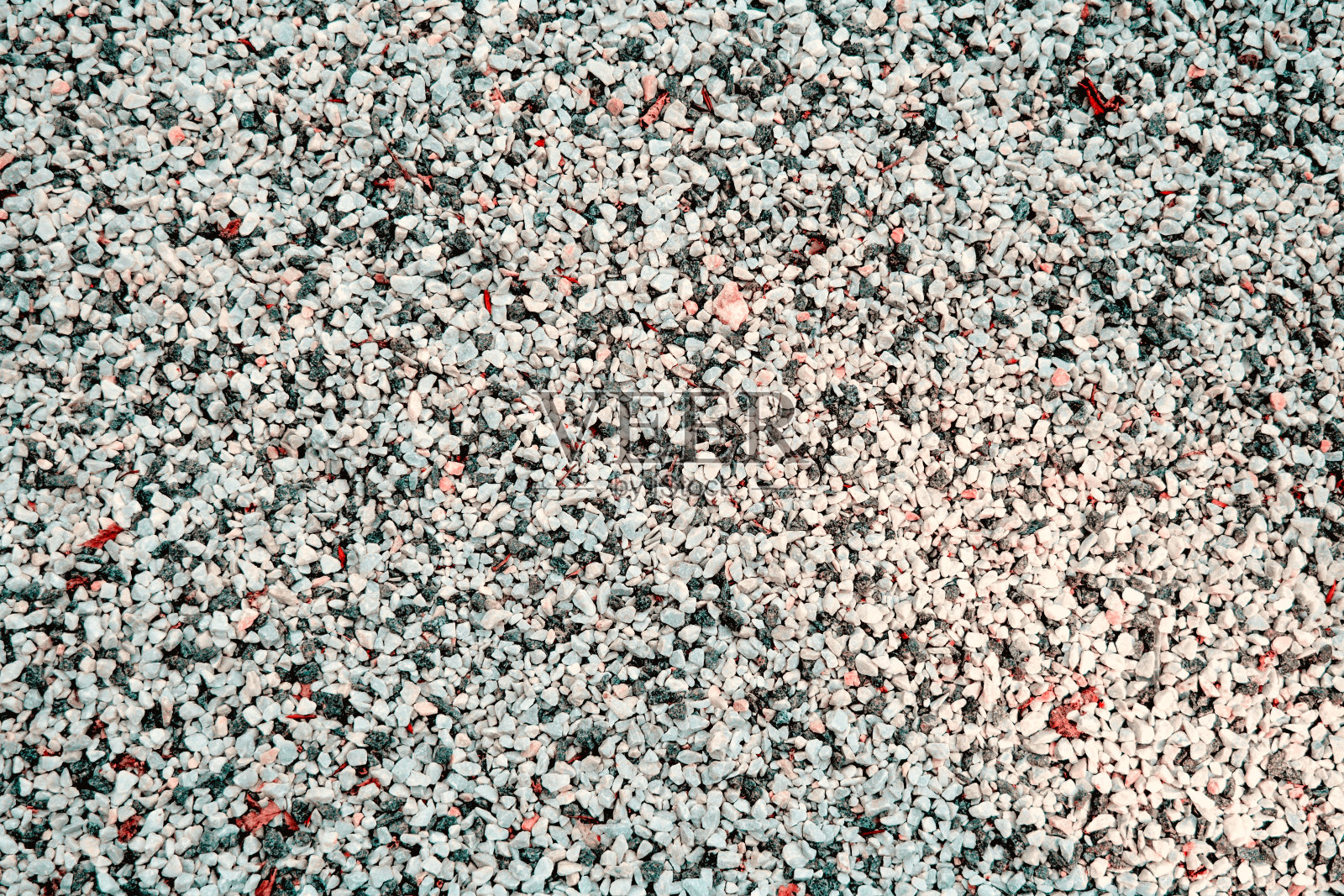 小的白色，黑色，黄色鹅卵石背景。俯视图砾石石纹理照片摄影图片