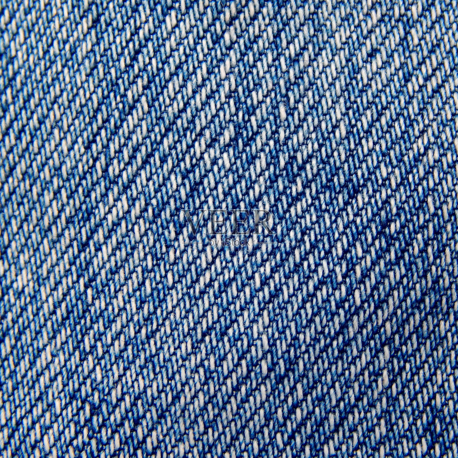 背景牛仔裤特写蓝色布料。背景牛仔裤特写蓝色布料照片摄影图片