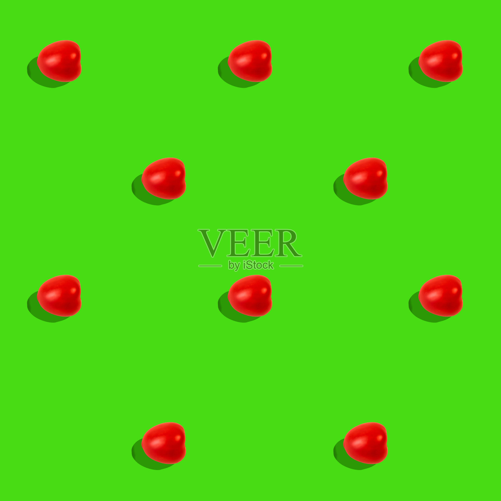 趋势图案西红柿在一个极简概念照片的绿色背景照片摄影图片