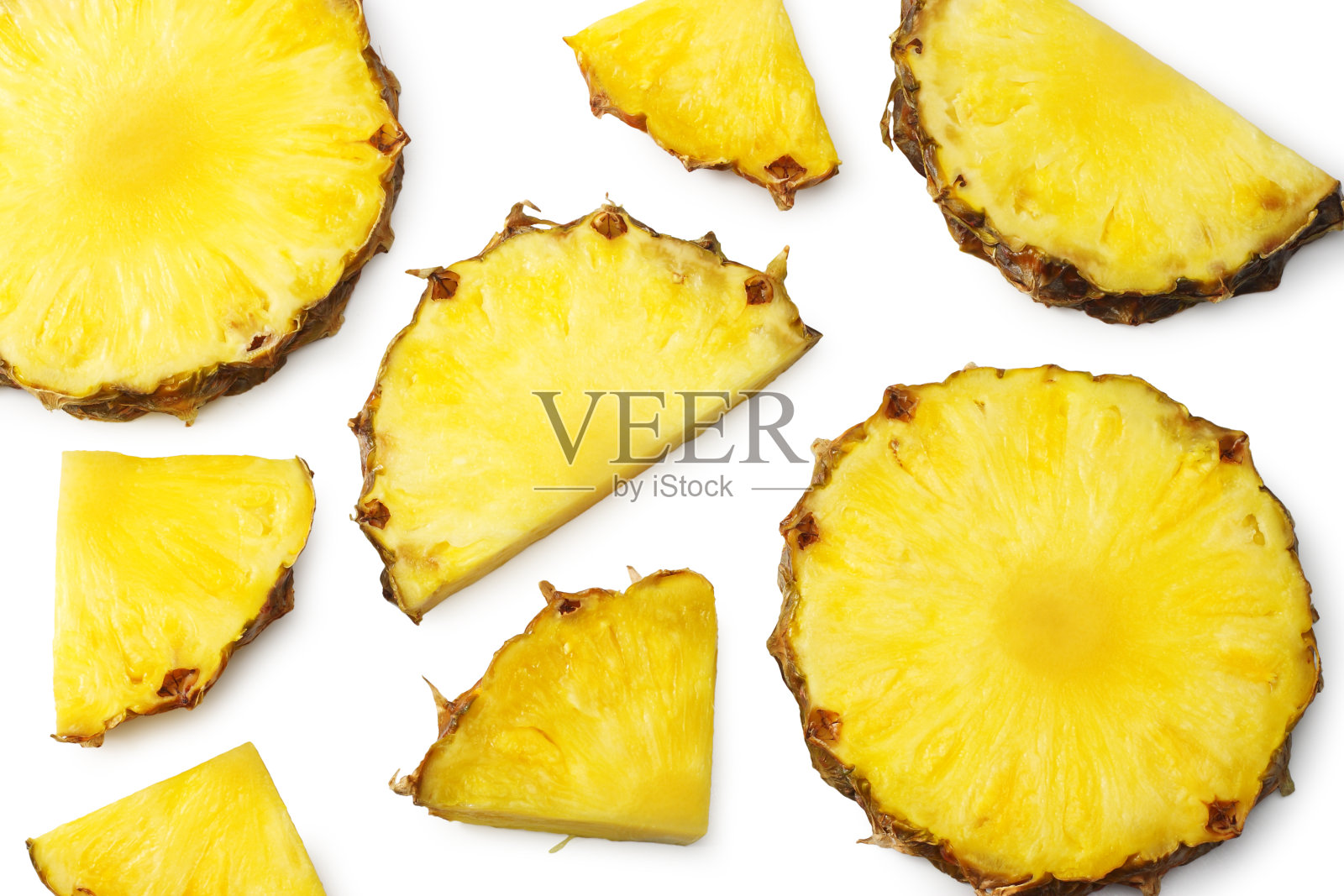 切片成熟的菠萝孤立在白色背景上。健康的背景。前照片摄影图片
