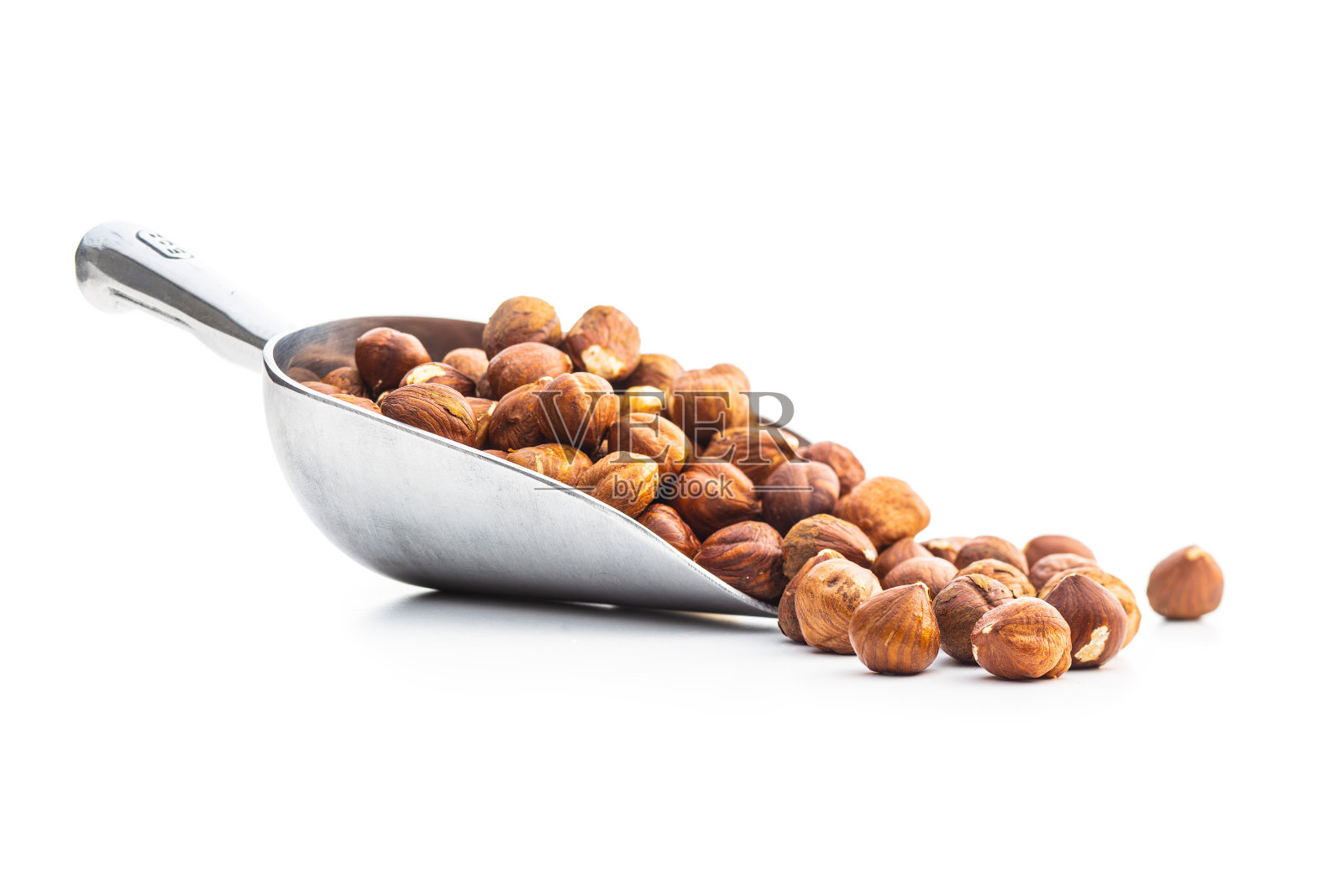 去皮榛子。照片摄影图片