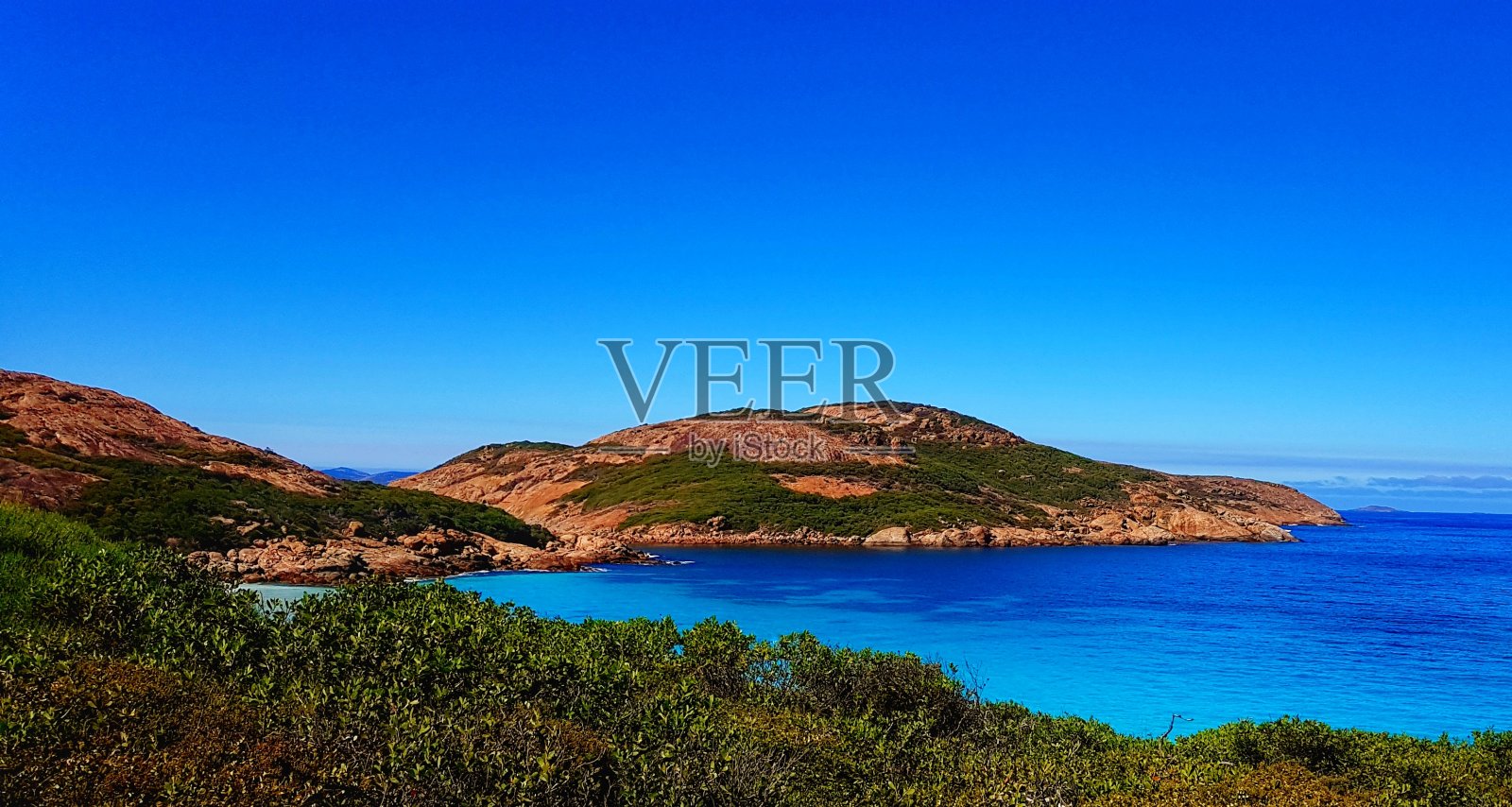 幸运湾起伏的岛屿照片摄影图片