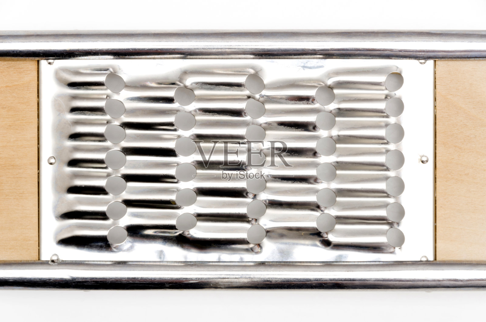 厨房用具，白色背景上的刨丝器照片摄影图片