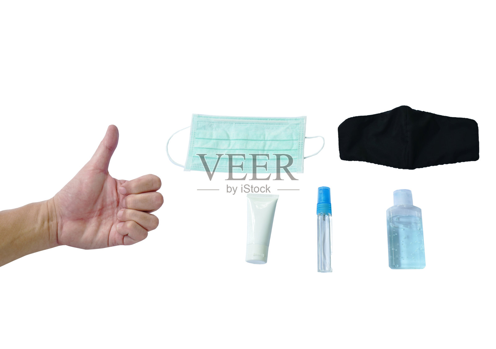 用手拇指向上伸至带有酒精凝胶的卫生口罩，为新冠病毒或新冠病毒时代的正常生活消毒必要物品照片摄影图片