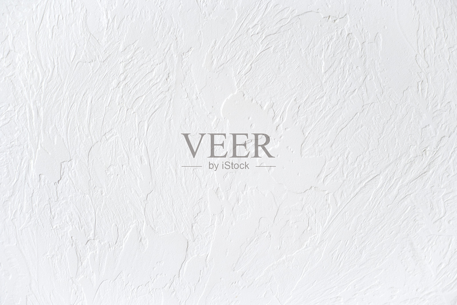 白色混凝土桌子的纹理。白色油漆纹理与刷子和调色板刀笔触有趣和现代的背景。照片摄影图片