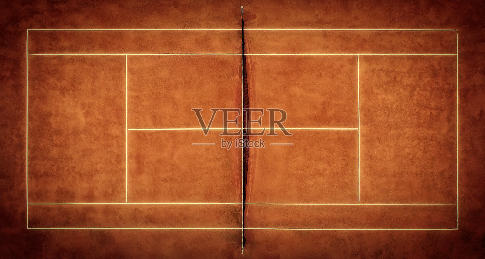 网球红土。从鸟的飞行角度看。照片摄影图片