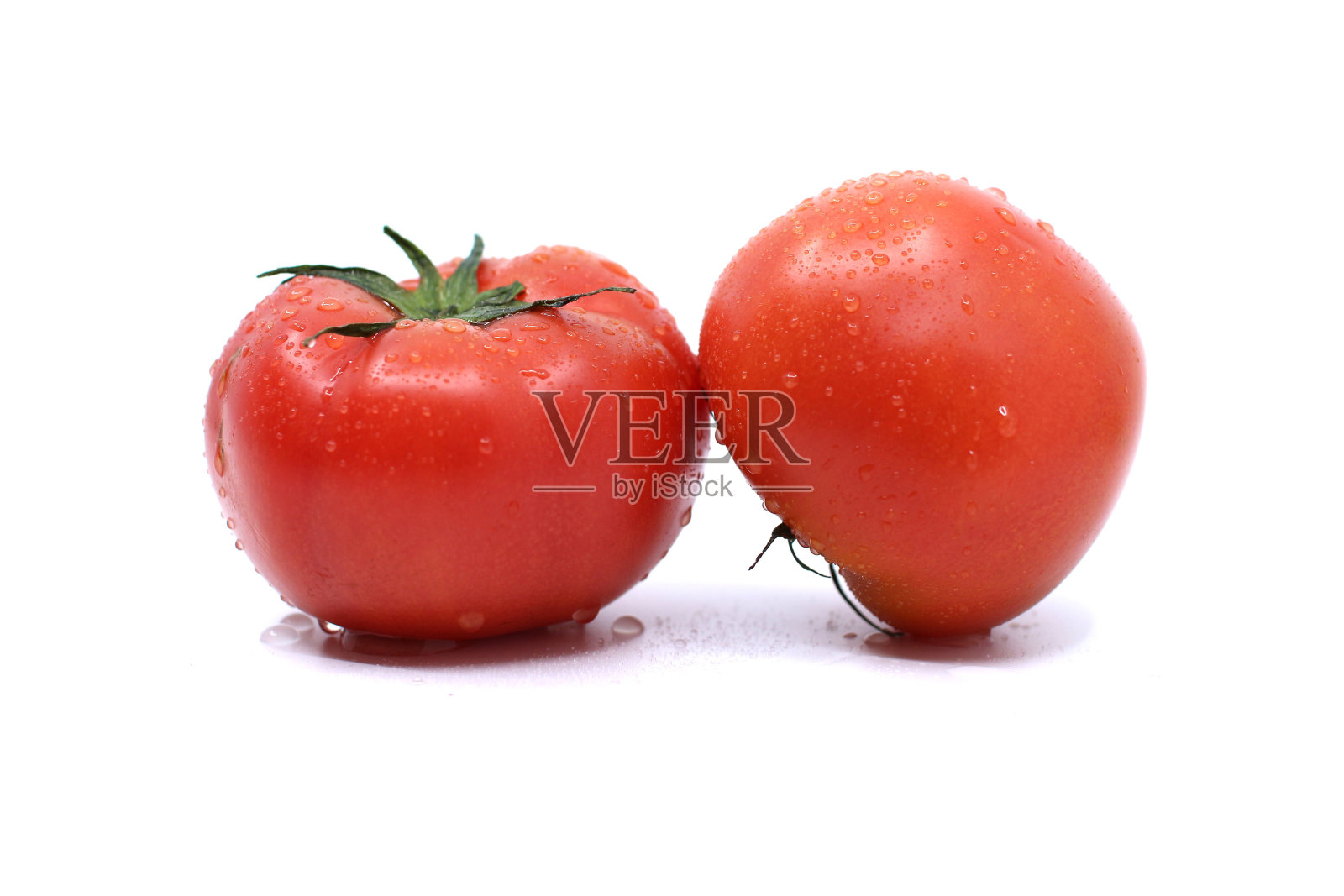 在白色背景下分离的番茄照片摄影图片