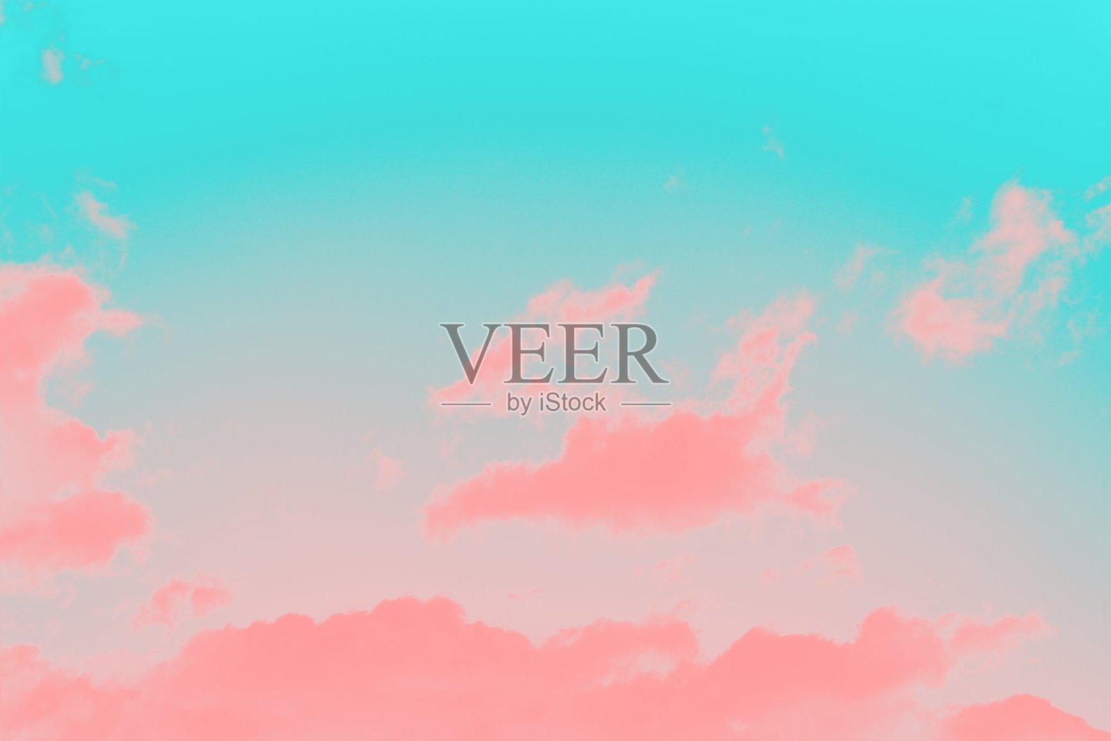 珊瑚色的云在薄荷色的天空背景照片摄影图片