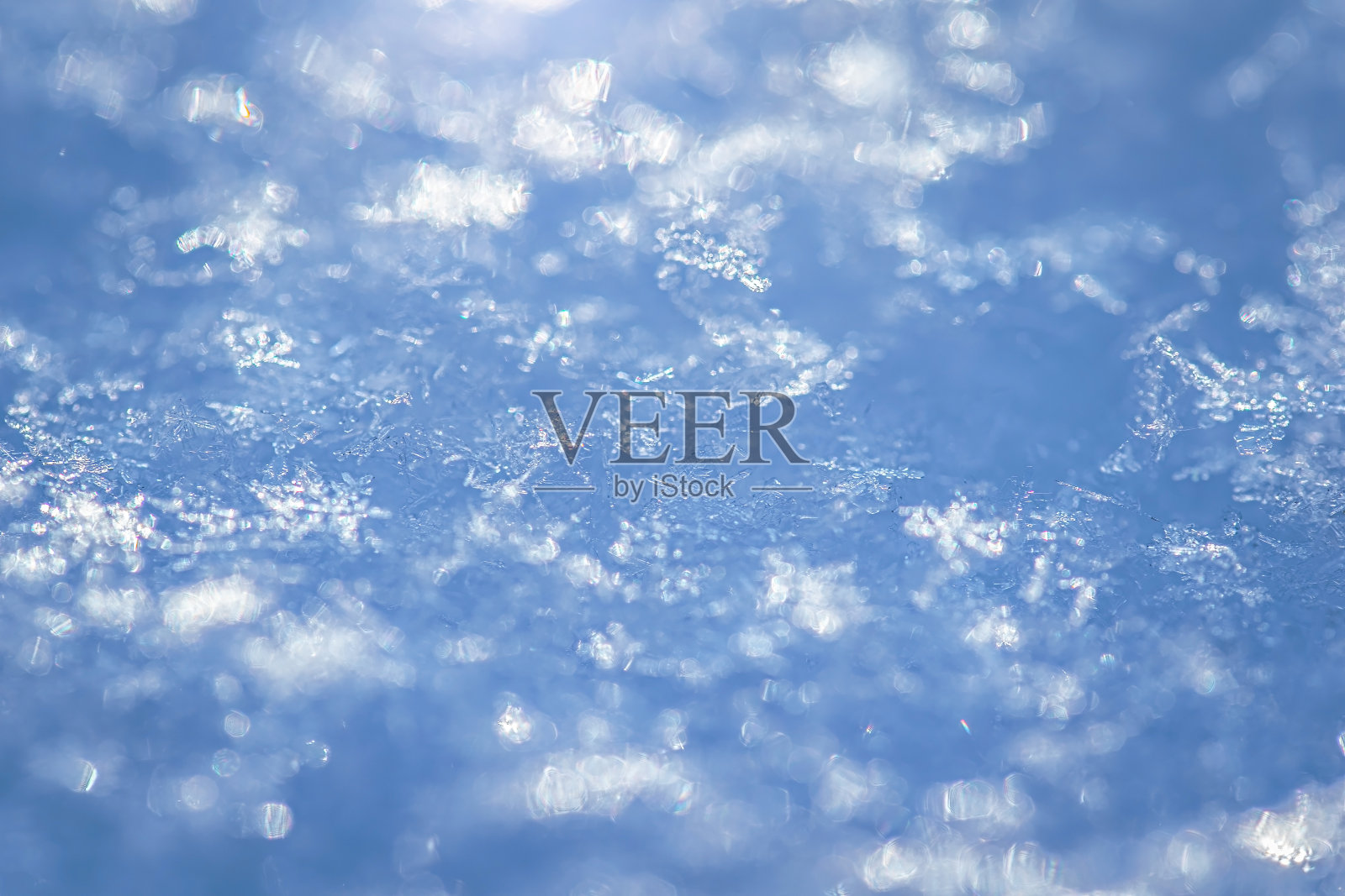 新鲜雪花纹理的宏观背景照片摄影图片