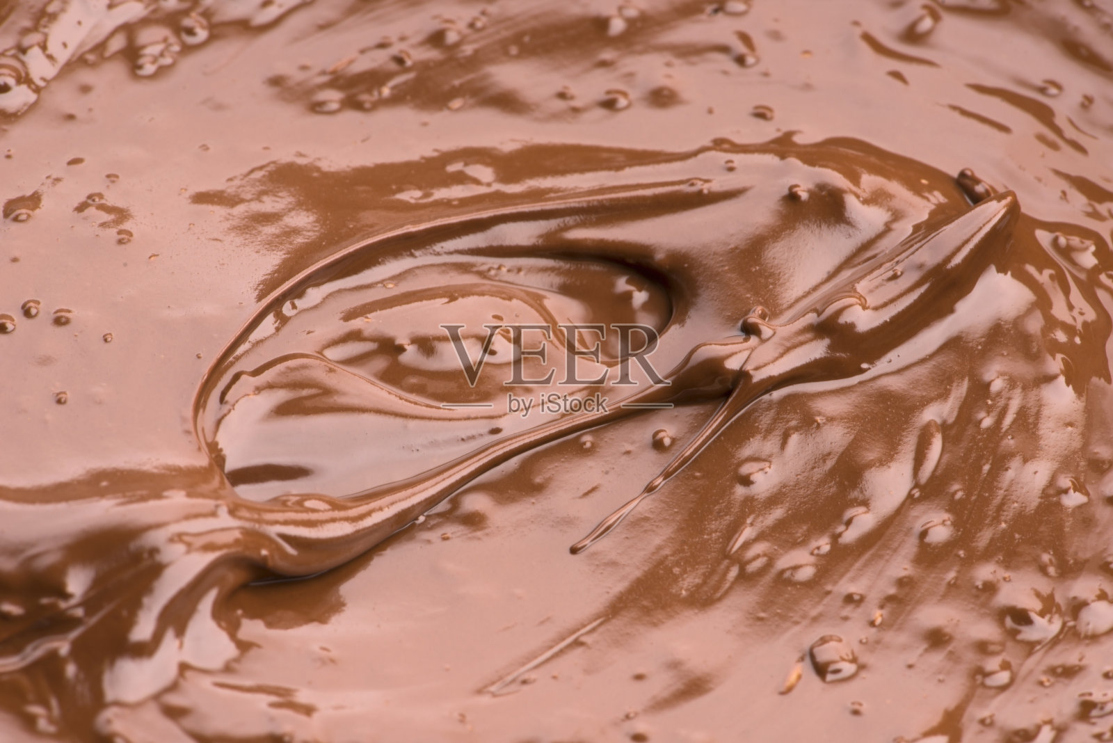 融化的巧克力背景。特写图像照片摄影图片