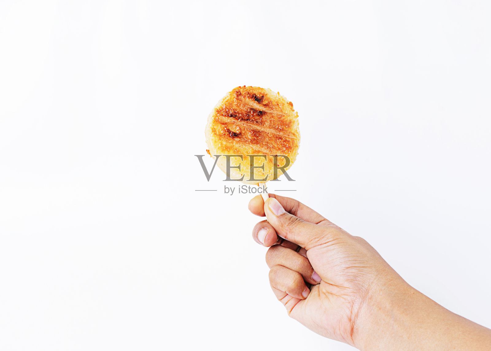 美味的烤糯米手握照片摄影图片