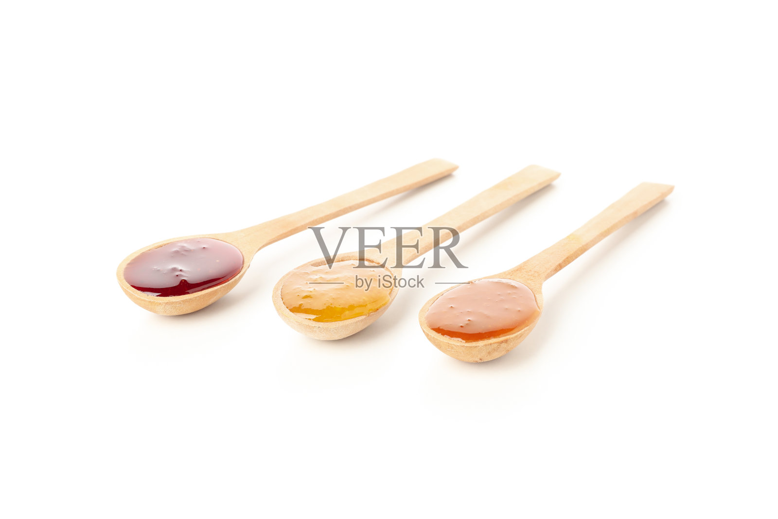 带有果酱的勺子孤立在白色背景上照片摄影图片