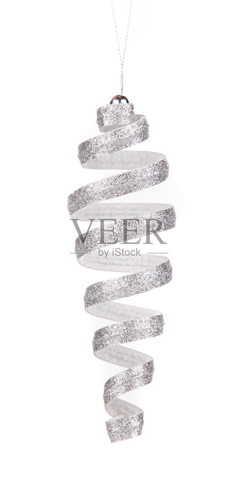 圣诞装饰螺旋玩具。照片摄影图片