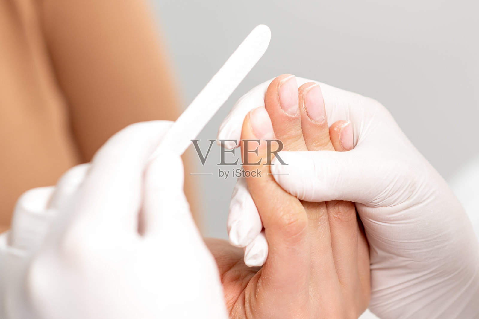 用指甲锉制作程序。照片摄影图片