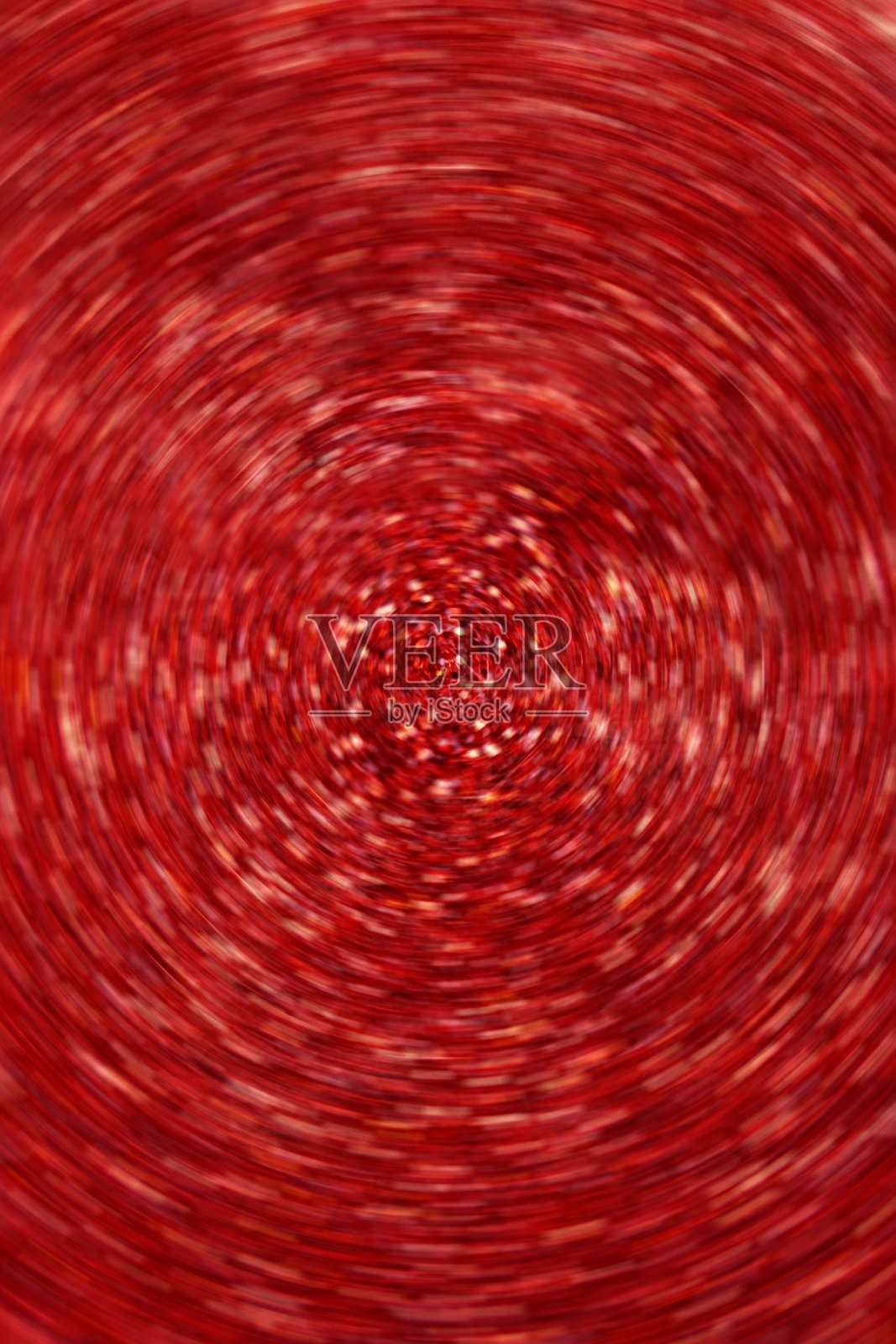 壁纸手机闪闪发光。红色闪亮模糊的背景。软的焦点。闪亮的红色散焦表面。闪亮闪亮的纹理。抽象闪烁的节日背景。照片摄影图片