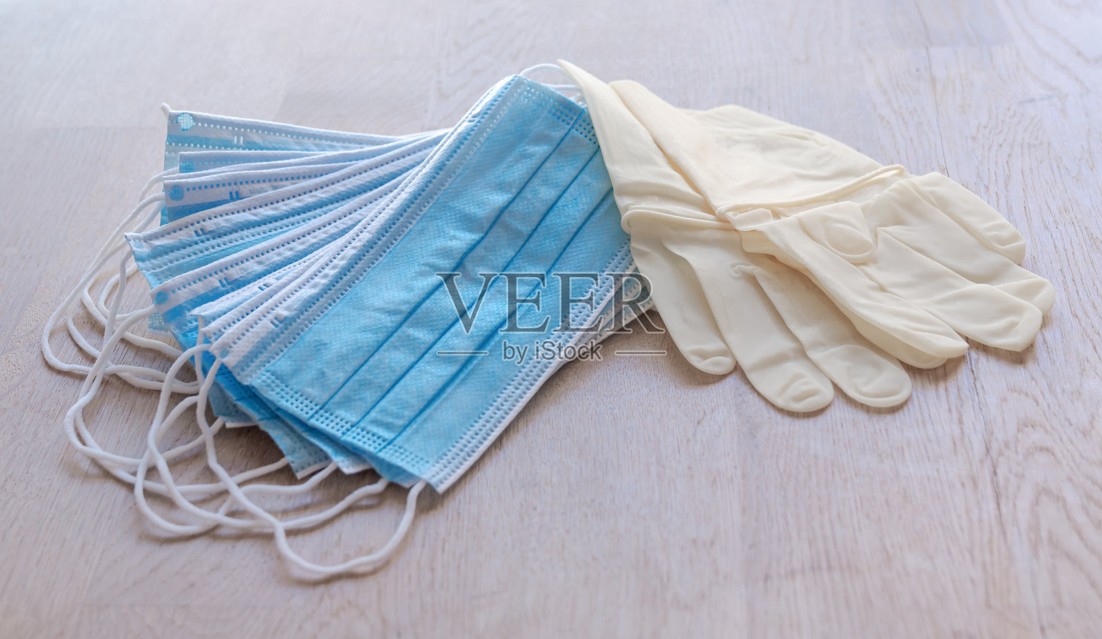 Covid-19、防护医疗设备消毒产品、洗手液、凝胶瓶、口罩、医疗用品照片摄影图片