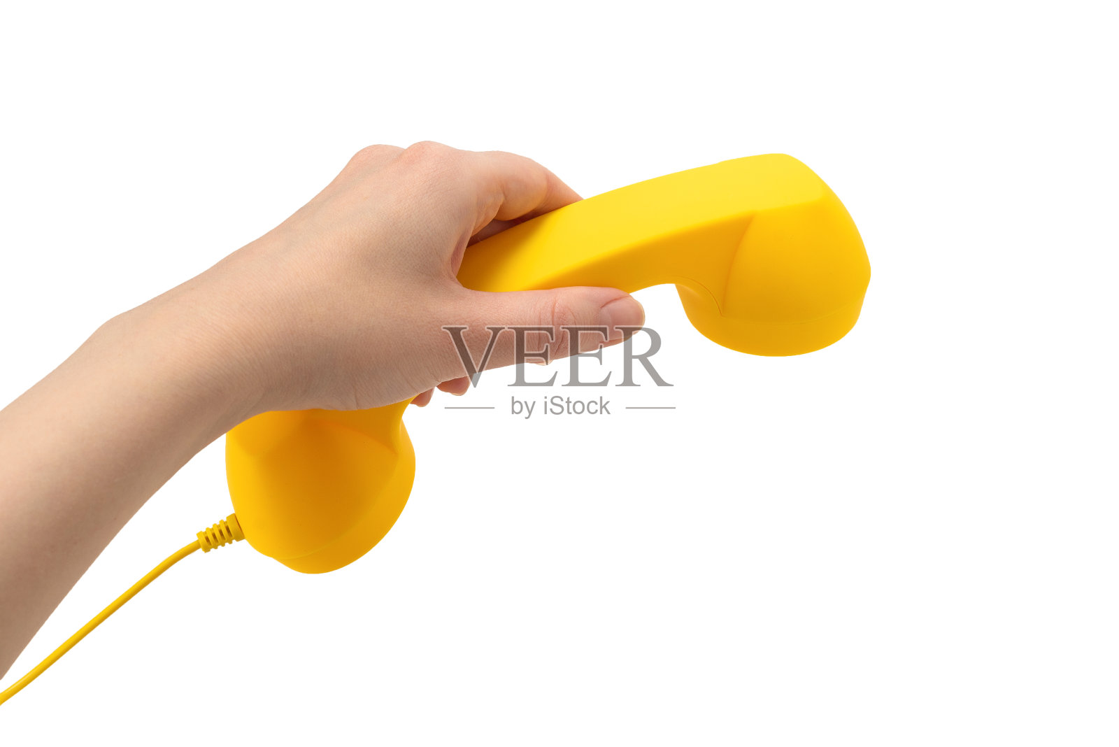 黄色手机在女人手上孤立在白色。照片摄影图片