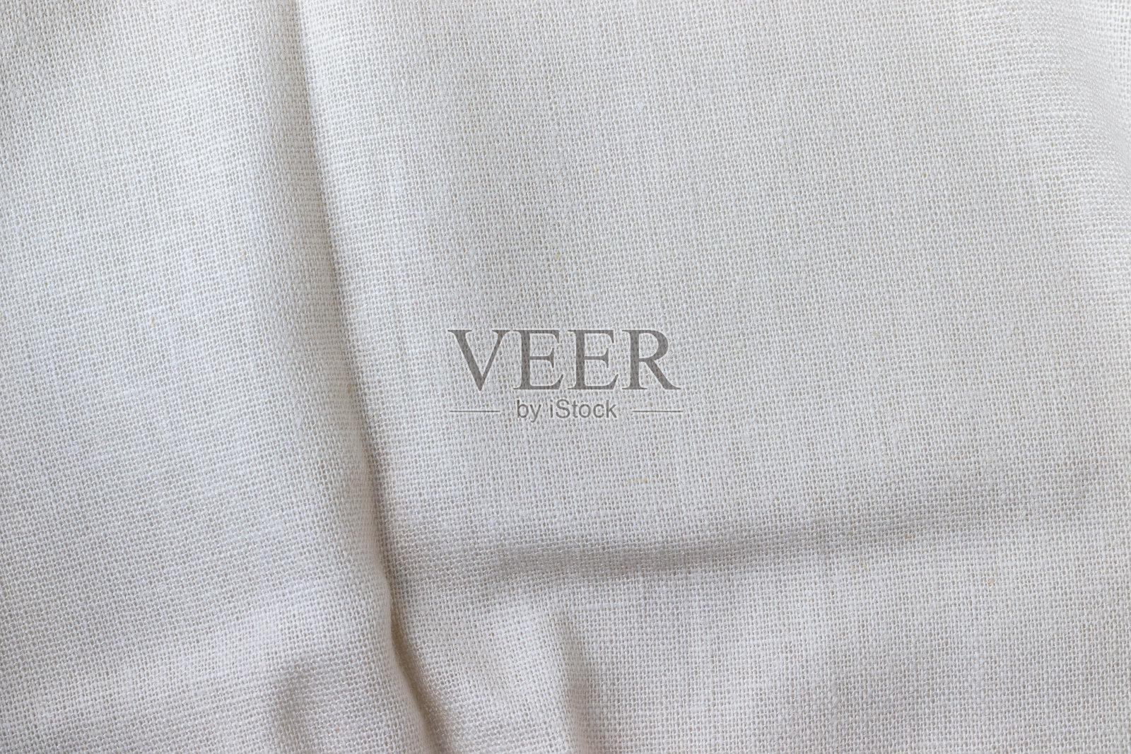 天然亚麻织物质地。粗糙皱巴巴的粗麻布背景照片摄影图片