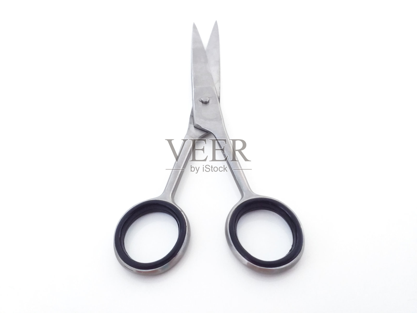 时尚专业理发剪，白色背景剪发。理发师沙龙概念。发型配饰照片摄影图片