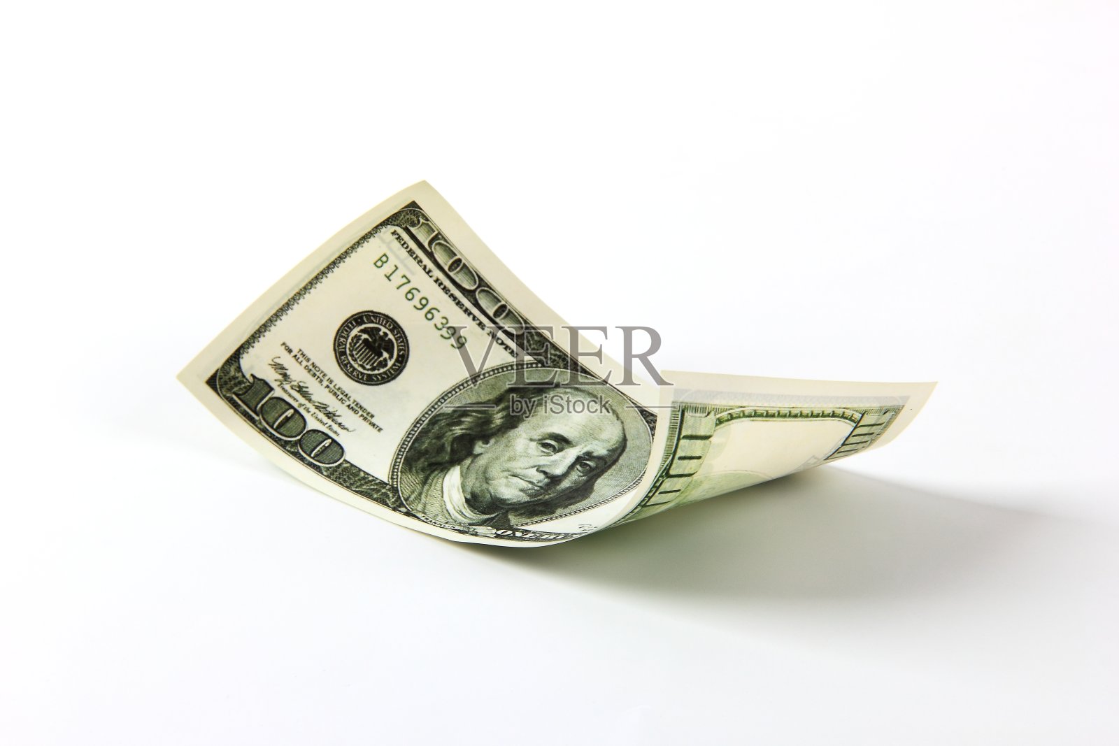 白色背景上的美国货币照片摄影图片
