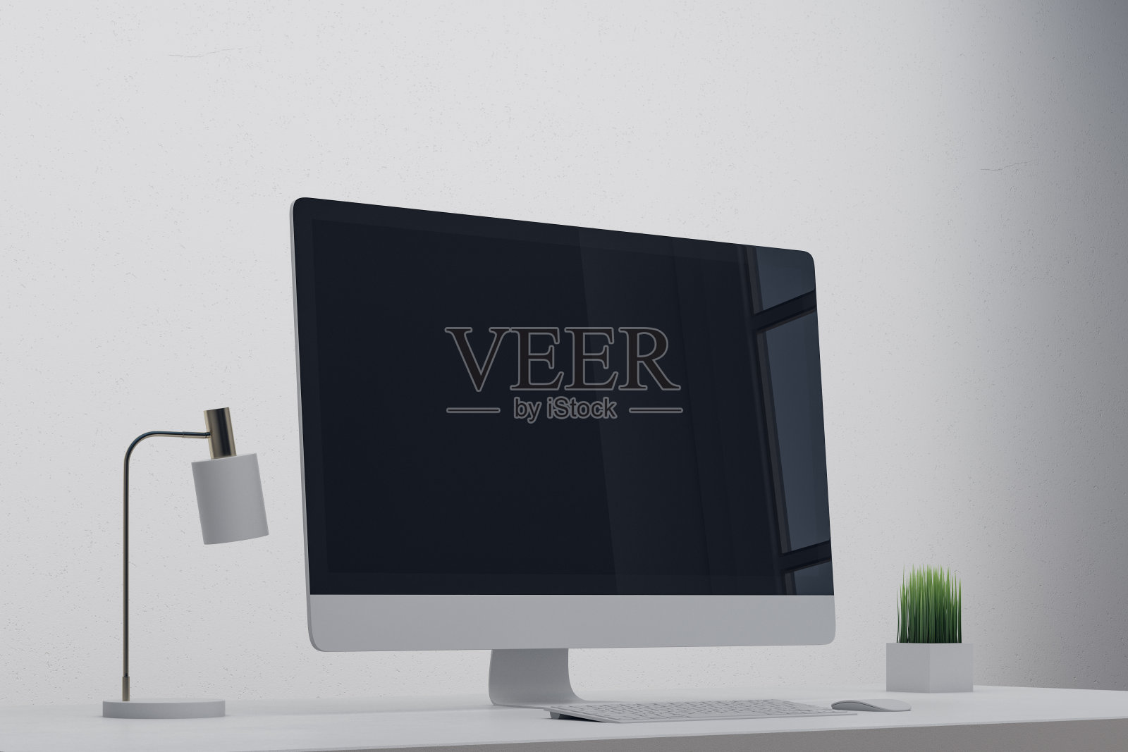 创意设计师的办公桌与空屏幕照片摄影图片