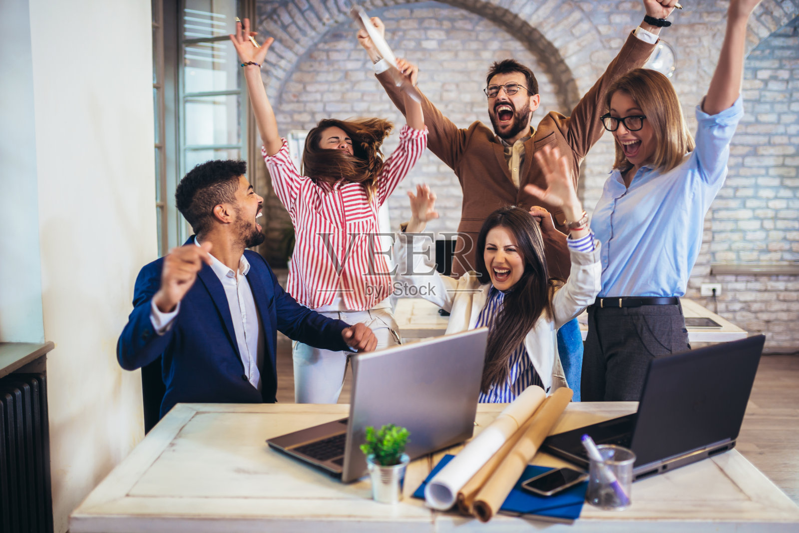 成功的企业家和商业人士实现目标照片摄影图片