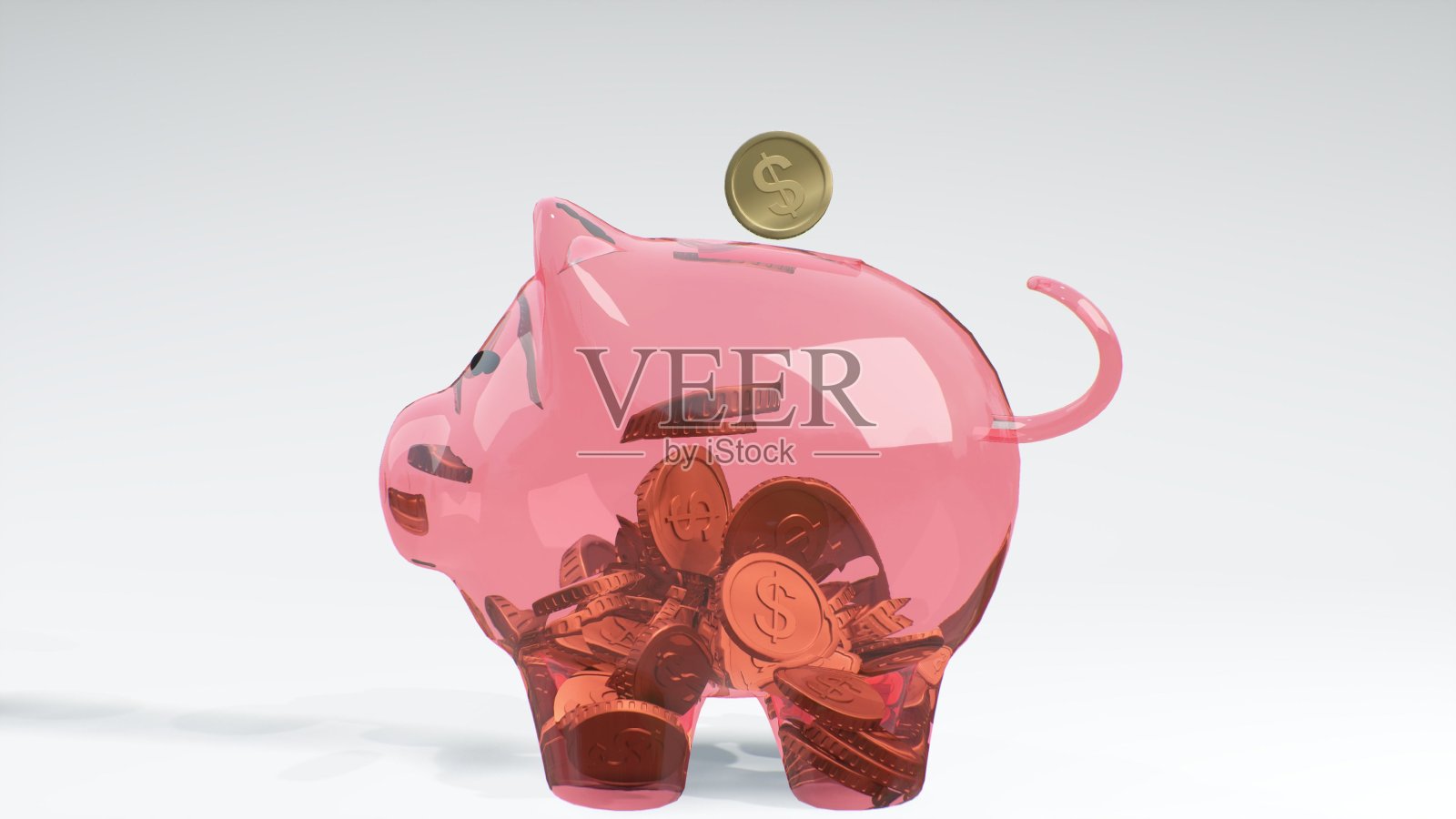 硬币落入一个粉色的玻璃储蓄罐——它象征着财富、节俭和有效的投资计划和商业。经济成功的象征。现金储蓄。照片摄影图片