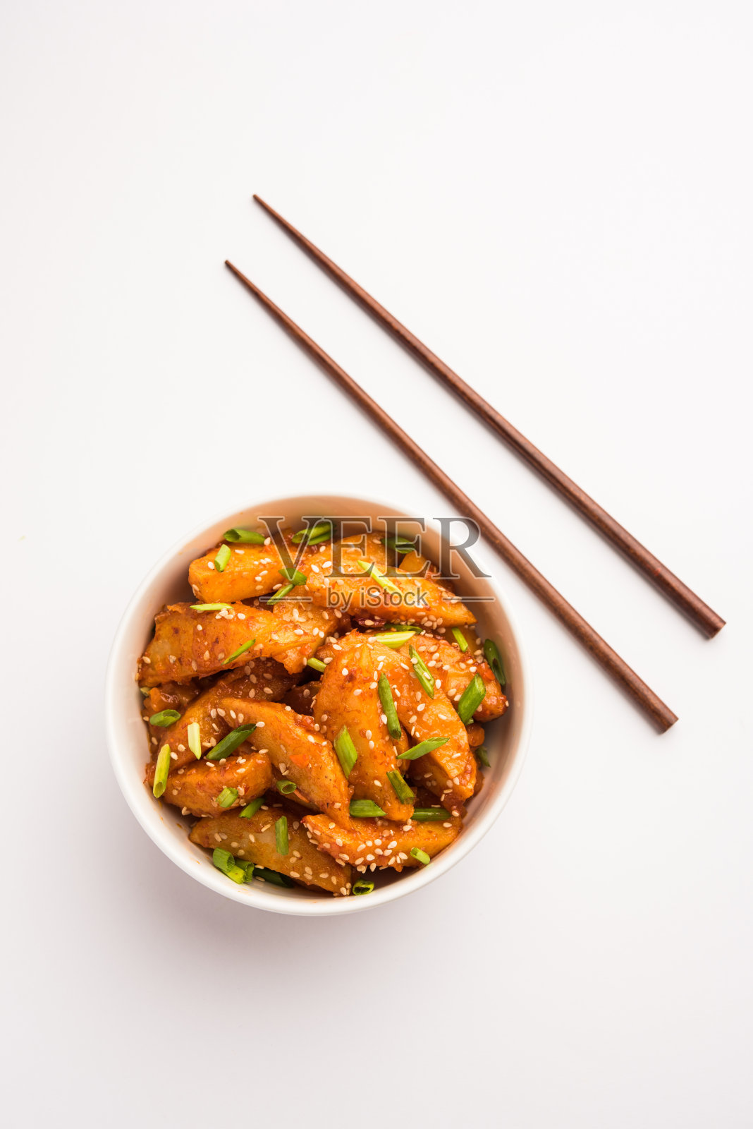 香脆的蜂蜜辣椒土豆是一种超级上瘾的印度中国菜小吃照片摄影图片