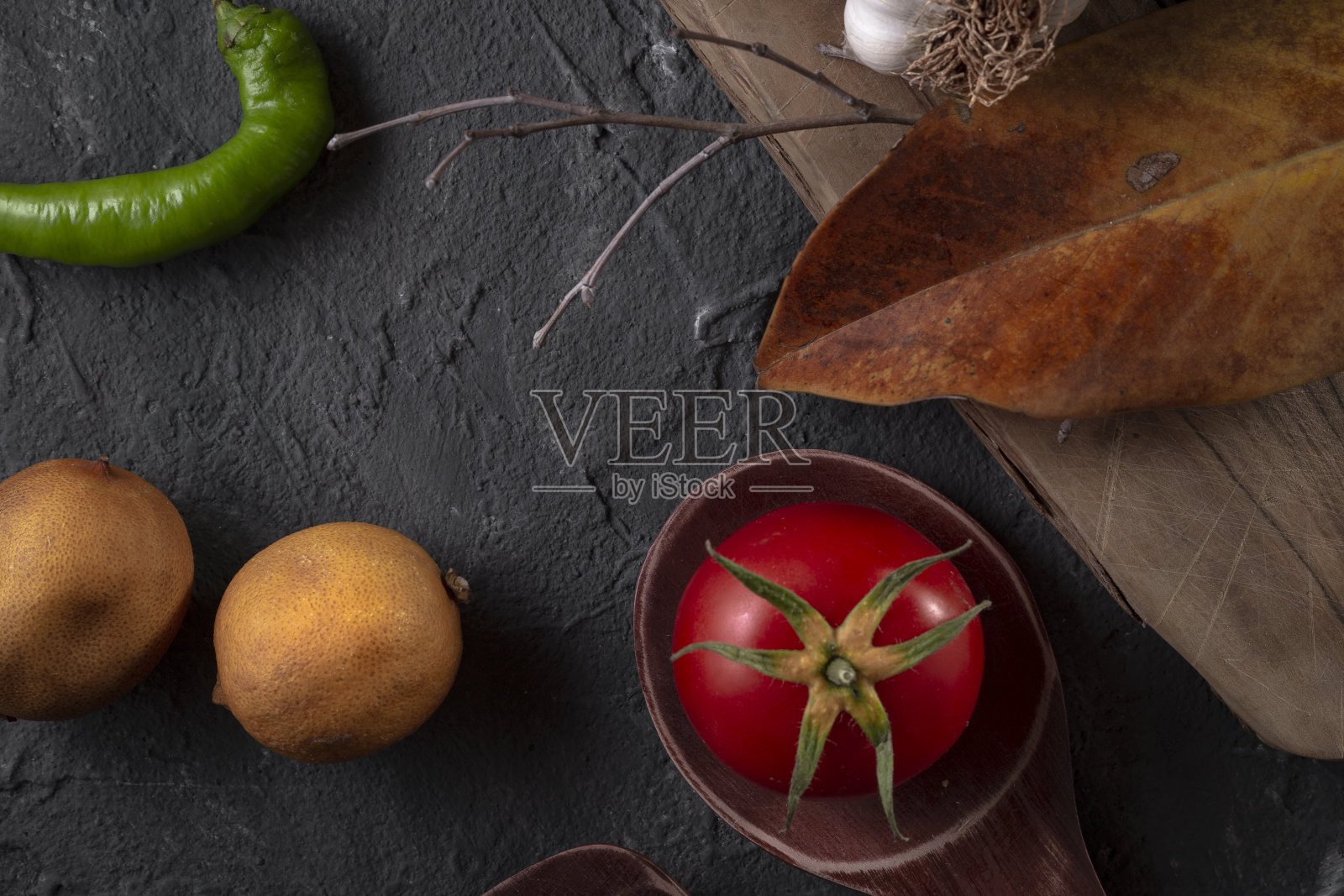 以石头为背景的谷物和蔬菜概念照片摄影图片