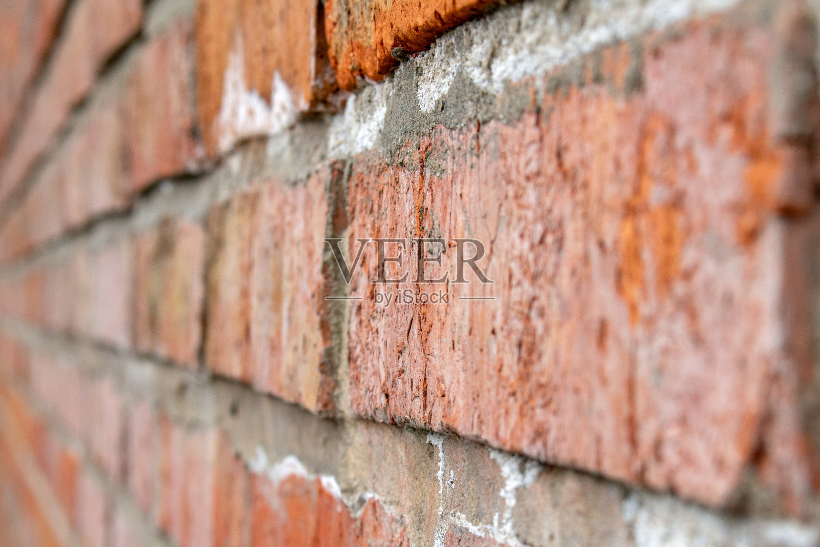 红色砖墙纹理近距离选择性聚焦照片摄影图片