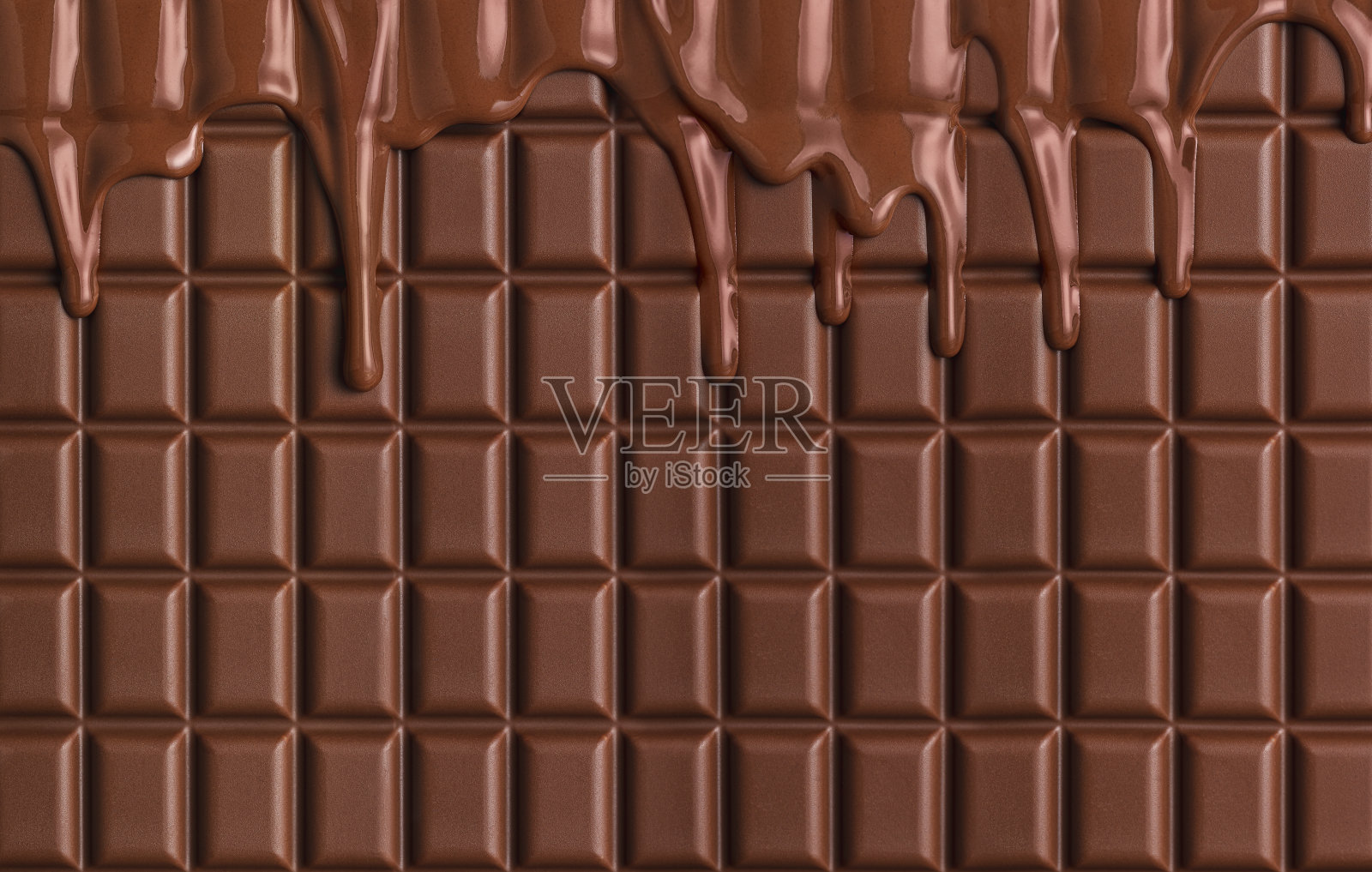 牛奶巧克力棒背景。融化巧克力滴。糕点配料照片摄影图片